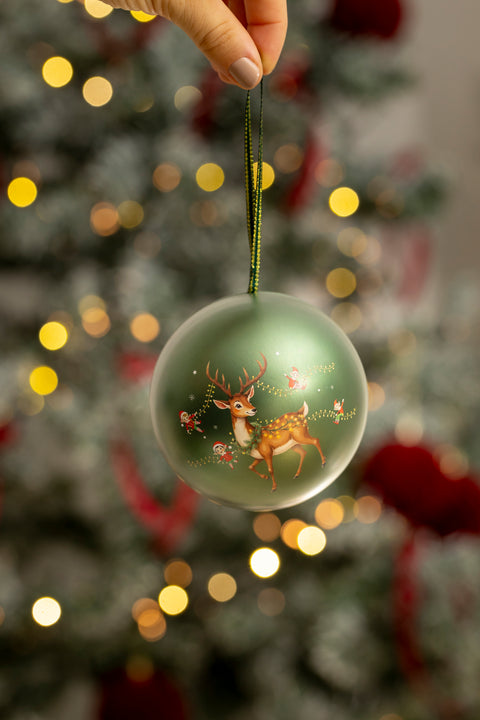 Weihnachtliche Kugel mit Rentieren und Elfen, gefüllt mit knusprigen Trüffel-Lollis 100g